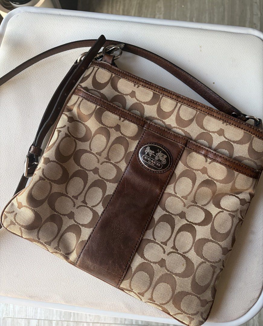 Coach Sutton Crossbody Bag (Category: Cross-body Bags) located in Manila. Submitted by silksyrenph (Listing ID 1469245354, Image 1). Description: - with signs of usage on leather - no rubs on canvas - no hangtag - 8.5/10 condition.