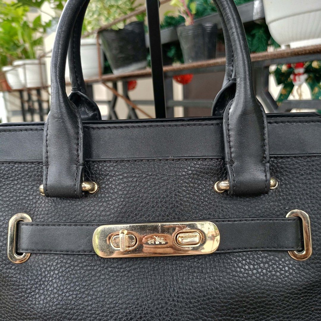 Coach Swagger 27 Satchel (Category: Cross-body Bags) located in Barugo. Submitted by green.trendsetter (Listing ID 1469283153, Image 2). Description: PRELOVED FINDS FROM JAPAN PLEASE READ BEFORE PURCHASING • PRELOVED MEANS PRELOVED. Each piece has been previously loved and may naturally have signs of use such as creasing, scratches, stains, discoloration, or other imperfections. Kindly manage your expectations accordingly. • AUTHENTICITY IS NOT G