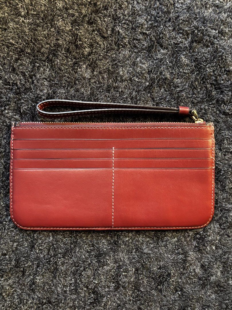 Coach Wrislet (Category: Wallets & Card holders) located in Pasay City. Submitted by N30G0TMYBAEK (Listing ID 1469271093, Image 2). Description: Original, like new condition.