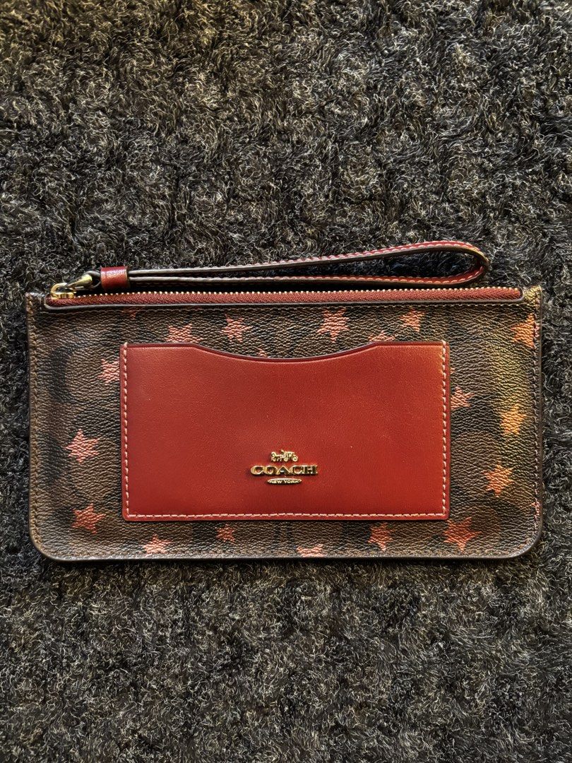 Coach Wrislet (Category: Wallets & Card holders) located in Pasay City. Submitted by N30G0TMYBAEK (Listing ID 1469271093, Image 1). Description: Original, like new condition.