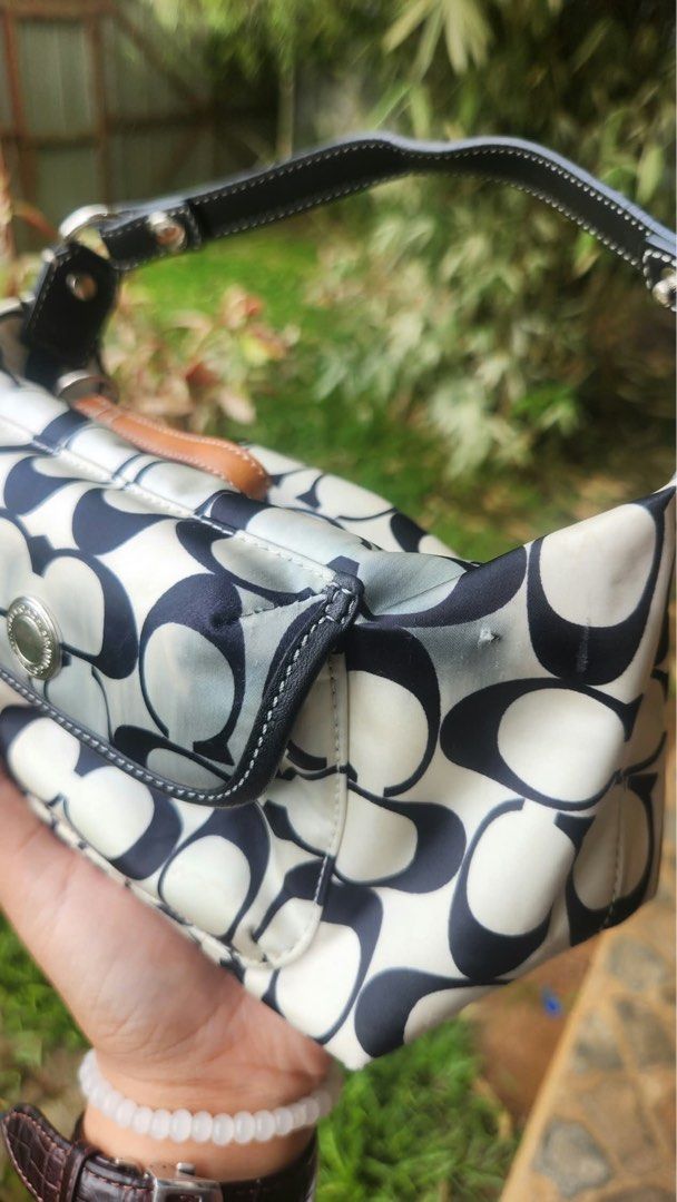 Coah Mini Soho (Category: Luxury Bags & Wallets) located in Cagayan de Oro. Submitted by KoaApparelAtbp. (Listing ID 1469300092, Image 2). Description: Coach mini soho bag has color transfer in front.. authentic. .