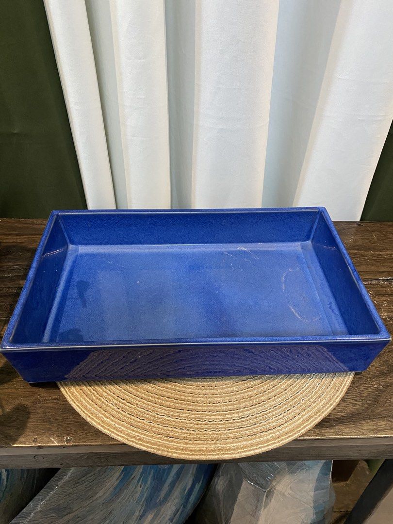Cobalt Blue Ceramic Rectangular Tray Dish (Category: Dinnerware & Cutlery) located in San Pedro. Submitted by jingay81 (Listing ID 1469375418, Image 1). Description: - Color: Striking cobalt blue with a glossy glaze finish - Material: Solid, heavy-duty ceramic that sits flat on surfaces - Dimensions: Roughly 14 inches long and 2 inches deep with high walls - Versatile use: Ideal catch-all for entryway keys, mail, trinkets, or as a stylish home de