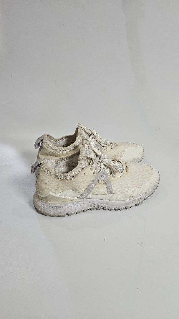 Cole Haan Zerogrand Golf Shoes (Category: Sneakers) located in Alfonso. Submitted by jbcamet (Listing ID 1469170512, Image 1). Description: - Brand: Cole Haan Zerogrand Golf Shoes - Color: Off-white - Size: 7B (Made in Vietnam) - Material: Water-resistant mesh upper with textured rubber outsole - Comfort: Cushioned yellow insoles - Condition: Normal wear with some dirt on midsoles and uppers; soles still have plenty of grip left.