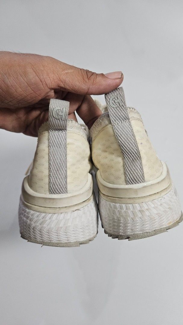 Cole Haan Zerogrand Golf Shoes (Category: Sneakers) located in Alfonso. Submitted by jbcamet (Listing ID 1469170512, Image 3). Description: - Brand: Cole Haan Zerogrand Golf Shoes - Color: Off-white - Size: 7B (Made in Vietnam) - Material: Water-resistant mesh upper with textured rubber outsole - Comfort: Cushioned yellow insoles - Condition: Normal wear with some dirt on midsoles and uppers; soles still have plenty of grip left.