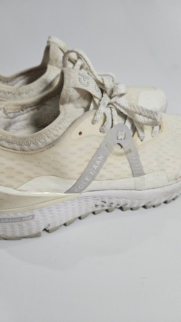 Cole Haan Zerogrand Golf Shoes (Category: Sneakers) located in Alfonso. Submitted by jbcamet (Listing ID 1469170512, Image 2). Description: - Brand: Cole Haan Zerogrand Golf Shoes - Color: Off-white - Size: 7B (Made in Vietnam) - Material: Water-resistant mesh upper with textured rubber outsole - Comfort: Cushioned yellow insoles - Condition: Normal wear with some dirt on midsoles and uppers; soles still have plenty of grip left.