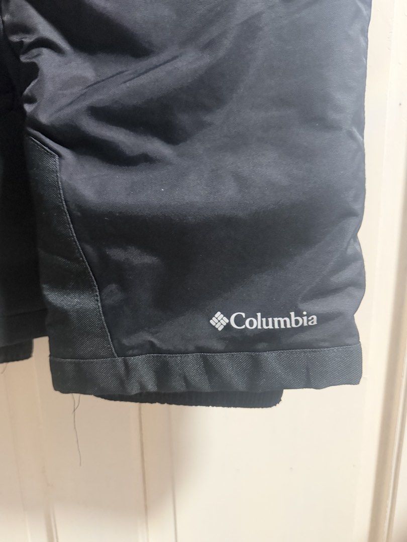 Columbia Black Snow Bib Overalls (Category: Jumpsuits) located in Tagum. Submitted by hachiiing (Listing ID 1469392975, Image 2). Description: - Brand: Columbia - Color: Black - Condition: Excellent / Like new - Adjustable shoulder straps for a custom fit - Secure front zipper closure - Reinforced patches at knees and ankles for extra durability - Columbia logo embroidered near the bottom left cuff - Ideal for winter vacations, skiing, snowboardi