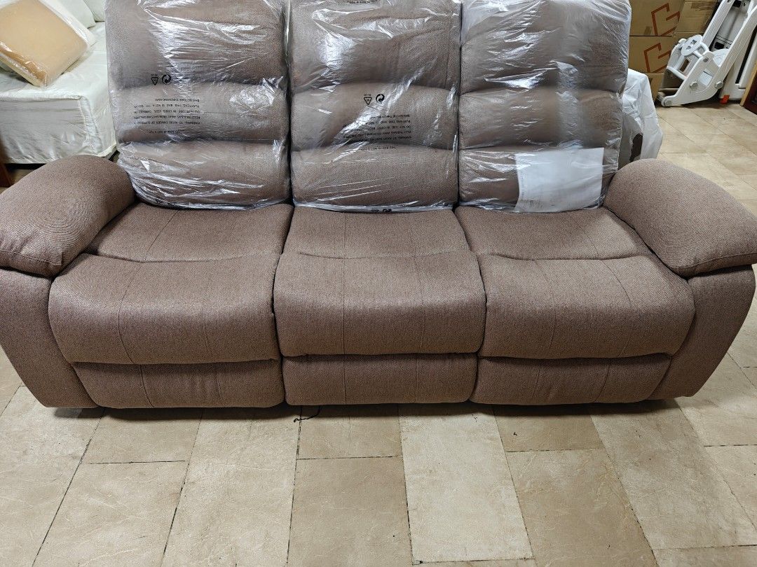 Comfortable Recliner Sofa Set - 3 Seater and 2 Seater (Category: Sofas) located in Quezon City. Submitted by parabuyalways (Listing ID 1461812513, Image 1). Description: - Comfortable recliner sofa set - Includes 3-seater and 2-seater sofas - Upholstered in soft, neutral beige fabric - Easy-to-operate recliners with side levers - Ideal for creating a relaxing living room space.
