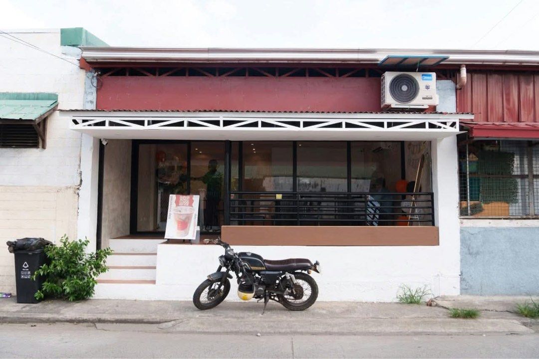 Commercial Cafe Space with Modern Interior and Storefront (Category: Commercial) located in Binan City. Submitted by eva.unit.07 (Listing ID 1469169150, Image 3). Description: Space For Rent in Macaria Village Pacita 1 Details: 60 sqm floor area with roll up doors Elevated Steps Porch Ceiling HVAC Line Separate Billing Utilities to Unit 1 Registered as commercial building, complete with permits Good for Business: Kiosk Coffee Shop Storage Service