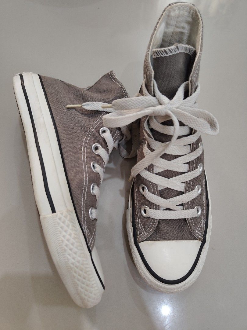 Converse All Star High Top Sneakers Grey Size 3 (Category: Sneakers) located in Calamba. Submitted by an_ne0501 (Listing ID 1469209627, Image 1). Description: - Brand/Model: Classic Converse High Tops - Color: Grey with white laces and toe caps - Size: 3 - Condition: Solid shape with slight wear around the midsoles; good tread left on rubber soles - Best for: Casual daily wear.