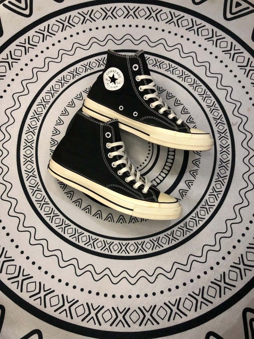 Converse Chuck 70 Hi Black High 🫶 (Category: Sneakers) located in Manila. Submitted by sonkicks (Listing ID 1469314148, Image 1). Description: - Item: Converse Chuck 70 High Top Sneakers - Color: Classic Black with white contrast stitching - Size: US Men's 8.5 / US Women's 10.5 / EUR 42 - Details: Glossy rubber midsoles and vintage license plates at the heels - Condition: Uppers are in solid shape, soles show minor wear - Closure: Traditional la