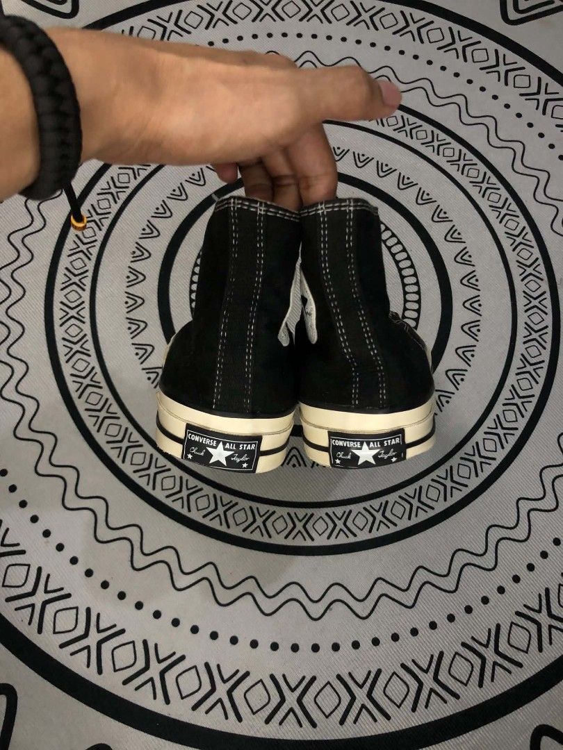 Converse Chuck 70 Hi Black High 🫶 (Category: Sneakers) located in Manila. Submitted by sonkicks (Listing ID 1469314148, Image 3). Description: - Item: Converse Chuck 70 High Top Sneakers - Color: Classic Black with white contrast stitching - Size: US Men's 8.5 / US Women's 10.5 / EUR 42 - Details: Glossy rubber midsoles and vintage license plates at the heels - Condition: Uppers are in solid shape, soles show minor wear - Closure: Traditional la