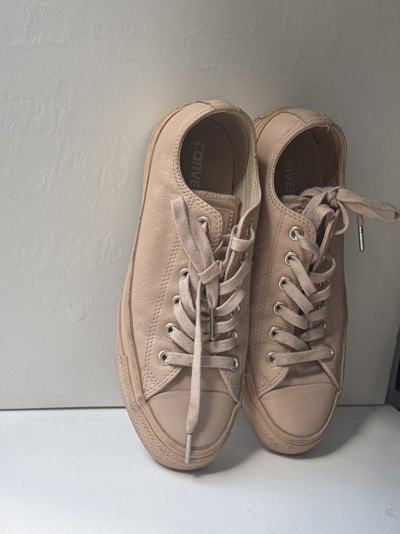 Converse Chuck Taylor (Category: Sneakers) located in Pasay City. Submitted by shop.stylestaple (Listing ID 1469168194, Image 1). Description: - Brand/Model: All Star Leather Low Top Shoes - Color/Material: Nude pink leather upper - Design: Classic round toe with rubber cap, matching laces, and silver-tone eyelets - Details: Converse logo printed on the inner sole - Bought in London - MEN’s 6 / WMNS 8 - LIMITED EDITION - Condition: Leather upper 