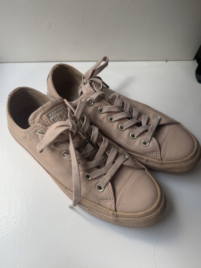 Converse Chuck Taylor (Category: Sneakers) located in Pasay City. Submitted by shop.stylestaple (Listing ID 1469168194, Image 2). Description: - Brand/Model: All Star Leather Low Top Shoes - Color/Material: Nude pink leather upper - Design: Classic round toe with rubber cap, matching laces, and silver-tone eyelets - Details: Converse logo printed on the inner sole - Bought in London - MEN’s 6 / WMNS 8 - LIMITED EDITION - Condition: Leather upper 