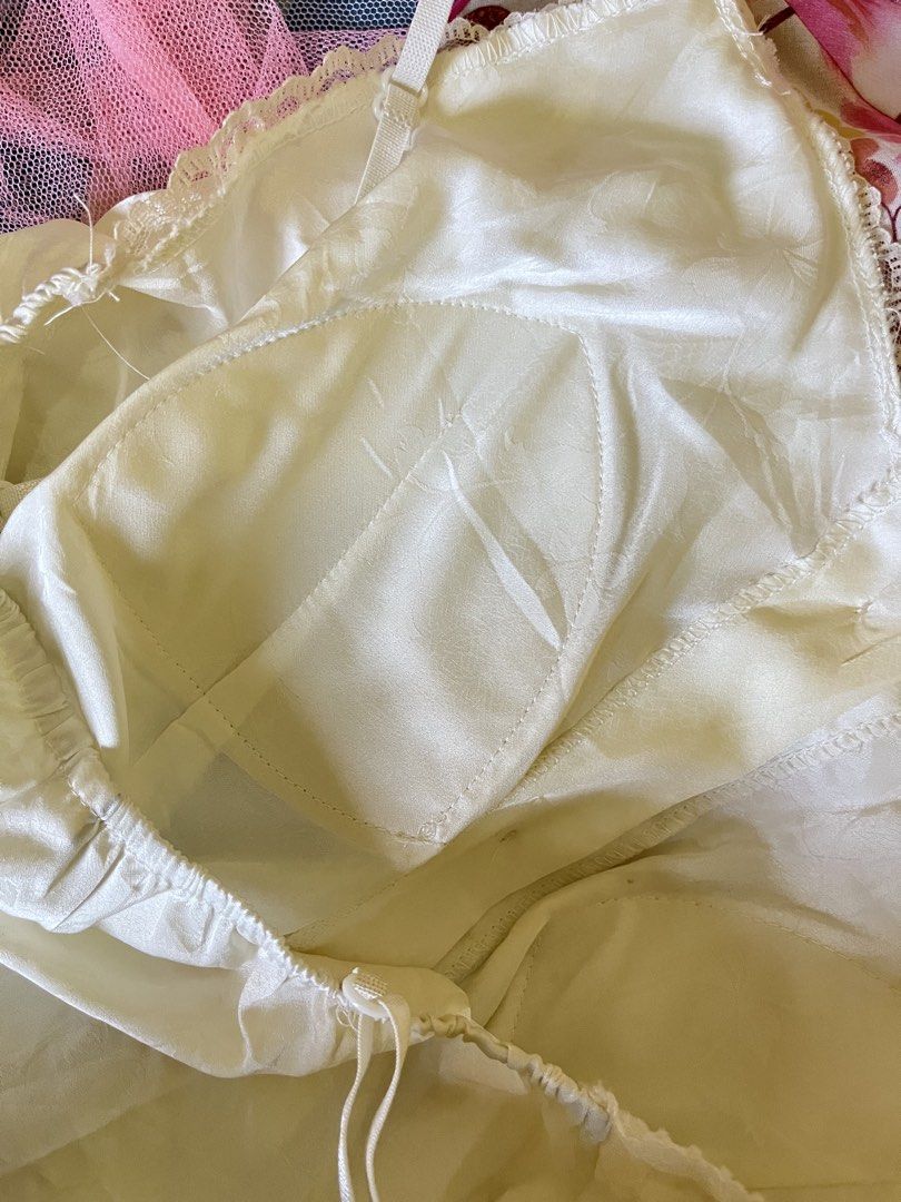 Coquette Cream Sleveless Top (Category: Sleeveless) located in Cabanatuan. Submitted by winx_closeth (Listing ID 1469217789, Image 3). Description: Satin Adjustable straps W/ built in bra Washable stain.