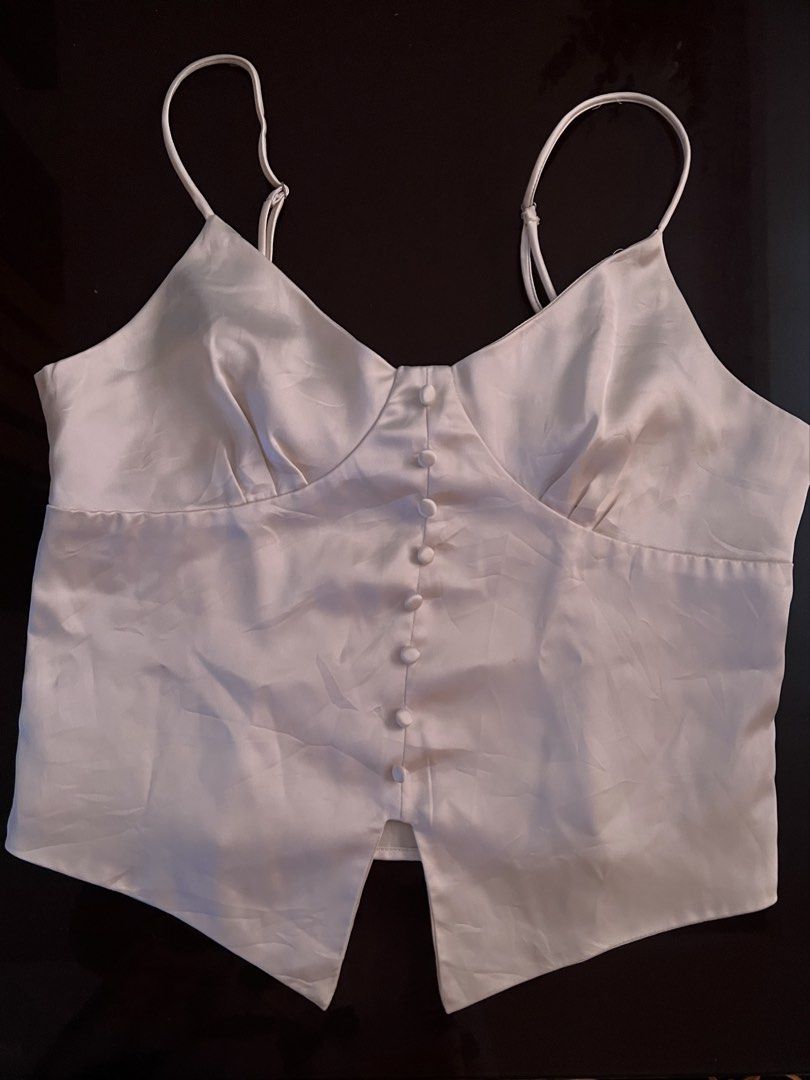 Corset Top (Category: Others Tops) located in Manila. Submitted by silver.rae (Listing ID 1469228040, Image 1). Description: satin fabric color beige/cream.