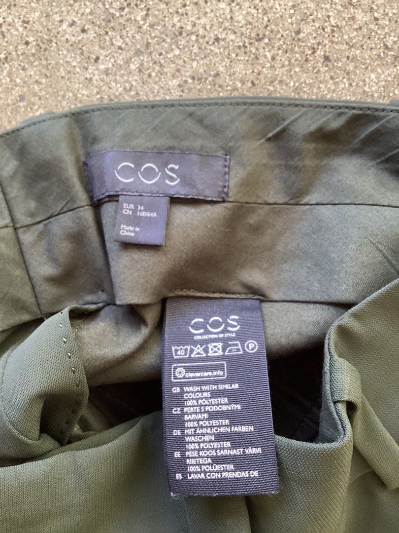 COS Olive Green Trousers EUR 34 (Category: Other Bottoms) located in Bacoor. Submitted by cts217 (Listing ID 1469280511, Image 3). Description: - Brand/Model: COS Trousers - Size: EUR 34 - Color: Olive Green - Material: 100% Polyester - Features: Elastic waistband, front slip pockets, two back welt pockets - Fit: Straight leg cut with center front seam detailing - Condition: Excellent, perfect for daily versatile wear.