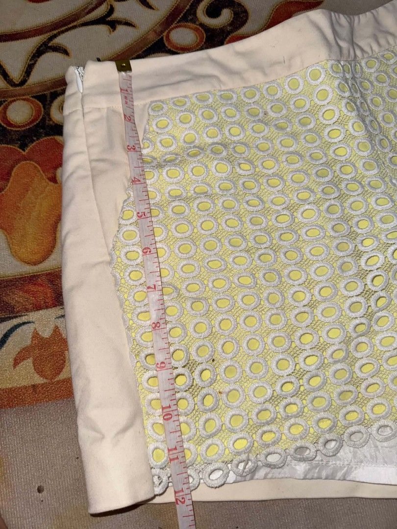 Cream and Yellow Circle Lace Pattern Tailored Shorts (Category: Shorts) located in Caloocan City. Submitted by mylove326 (Listing ID 1469239665, Image 3). Description: - Cream tailored shorts with unique yellow and white round lace overlay panels - Features a clean back with two welt pockets and a structured waistband - Convenient side zipper closure - Length: approximately 12 inches - Great statement piece for warm weather and OOTDs .