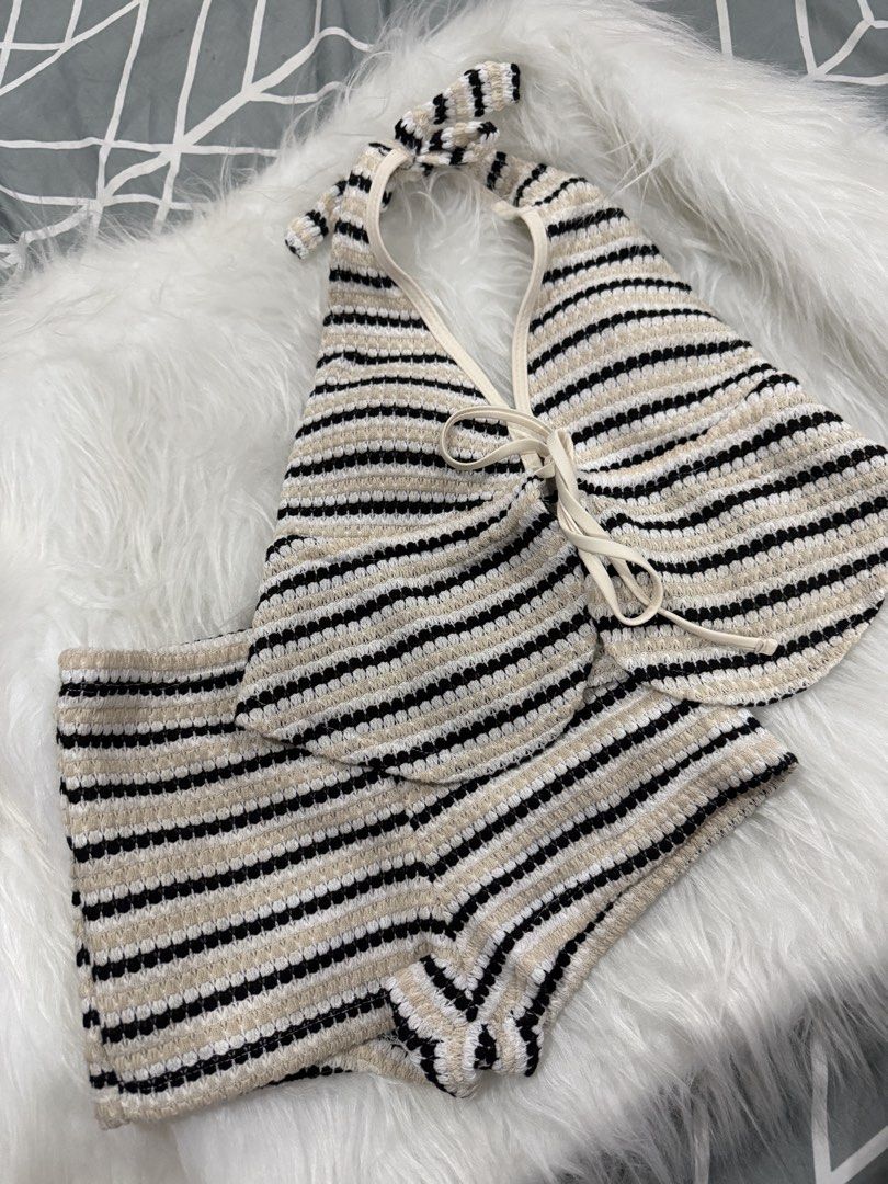 Crochet halter top and shorts set stripe (Category: Bikinis & Swimsuits) located in Las Pinas. Submitted by juls_mp (Listing ID 1469330509, Image 1). Description: - Style: Striped knit halter top and high-waist shorts matching set - Color: Classic black, white, and beige - Material: Soft, textured, and lightweight knit (easy to pack) - Perfect for: Beach trips, vacations, and casual summer days - Condition: Worn once, freshly washed, and ready to
