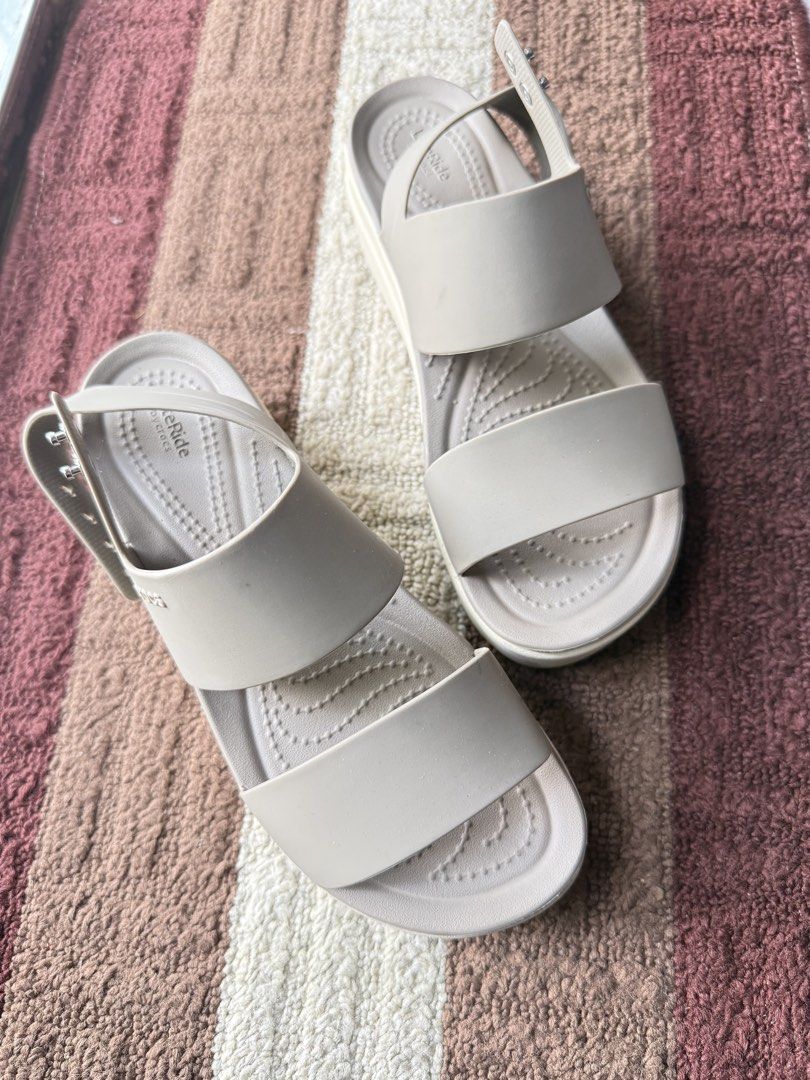 Crocs LiteRide Platform Sandals Beige (Category: Sandals) located in Davao. Submitted by ishtaranne (Listing ID 1469213058, Image 1). Description: - Brand: Crocs LiteRide - Style: Platform sandals with chunky sole and dual straps - Color: Versatile neutral beige - Fit/Closure: Adjustable heel strap with secure metal button - Comfort: Soft, textured footbed for extra grip and cushioning.