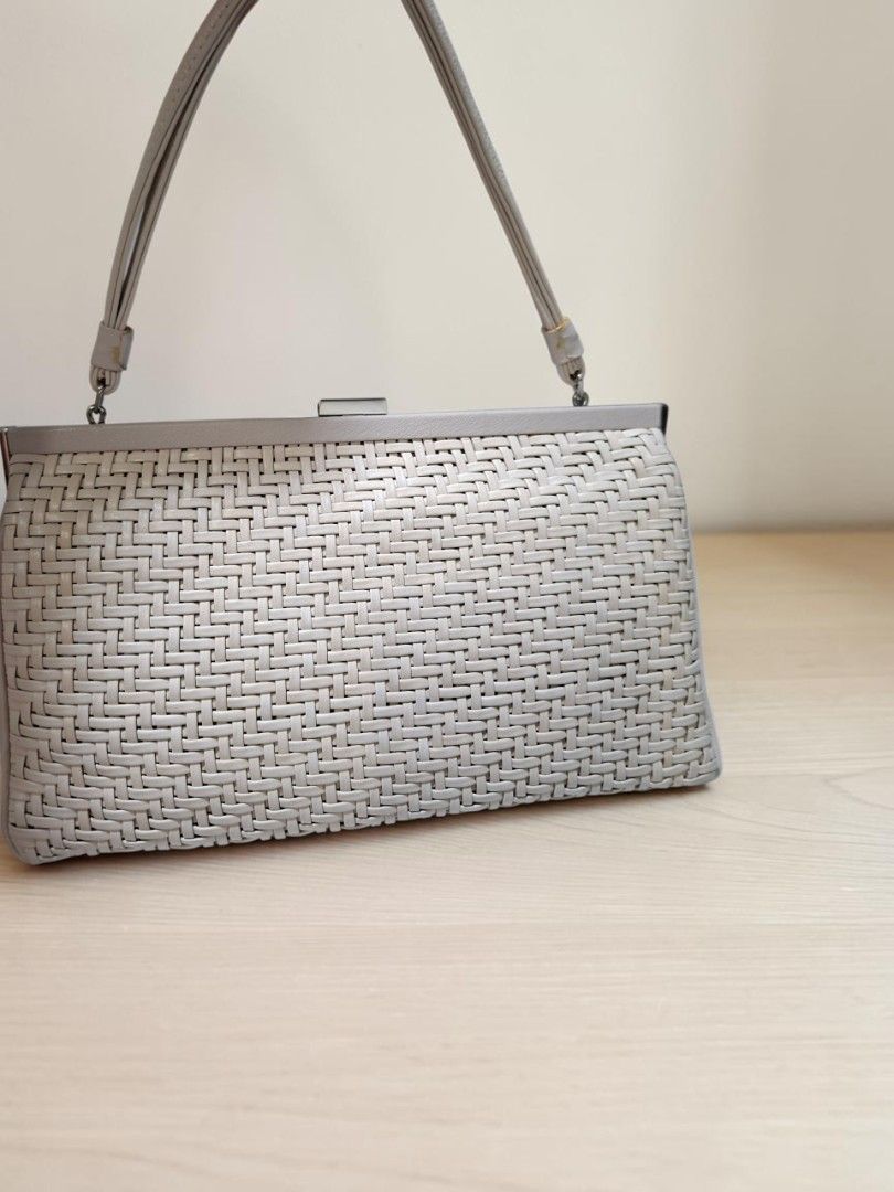 CROWN GENUINE LEATHER WOOVEN PURSE (Category: Purses & Pouches) located in Las Pinas. Submitted by annachiaonair2037 (Listing ID 1469264186, Image 3). Description: CROWN GENUINE LEATHER WOVEN PURSE FROM JAPAN RARE TYPE OF PURSE H 6" L 10" W 2.5" Disclaimer: I am not affiliated with, associated with, or authorized by any of the brands featured posted. Any mention of brand names, trademarks, or logos is solely for identification and reference purpo