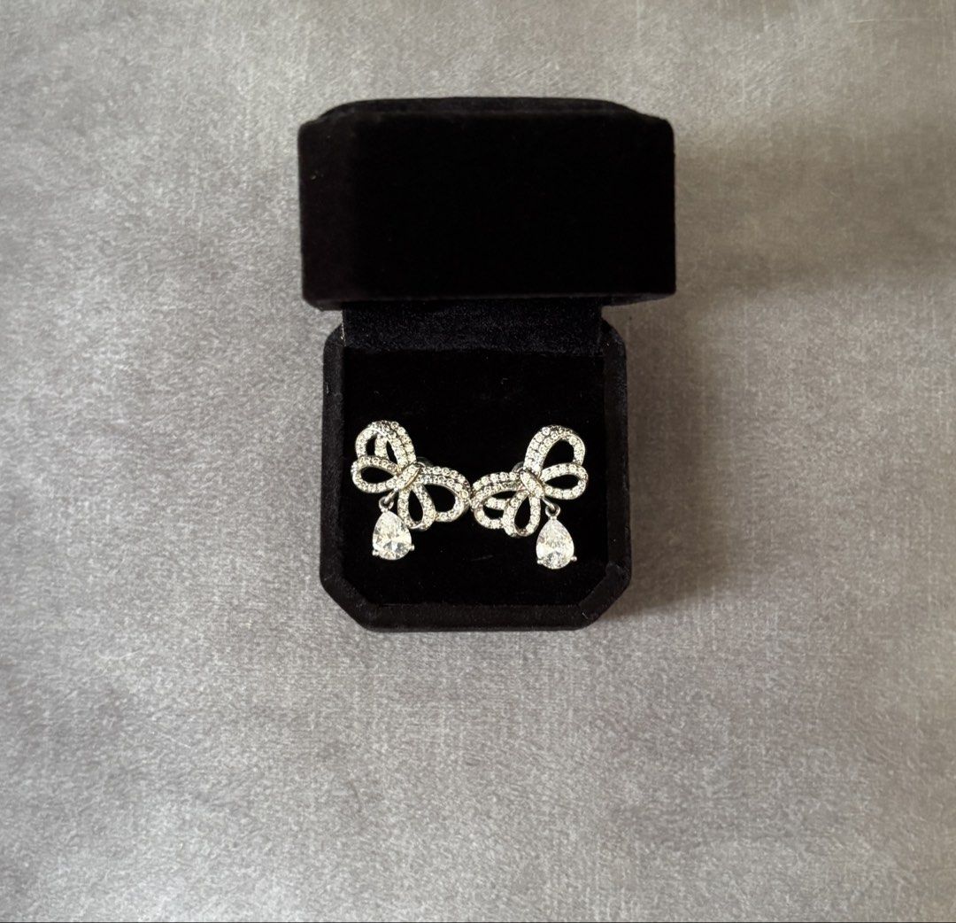 Cubic Ziraconia Bow Statement Earrings Diamond Dangling Earrings (Category: Earrings) located in Cebu City. Submitted by whiterabbitmint (Listing ID 1469185575, Image 3). Description: With box.