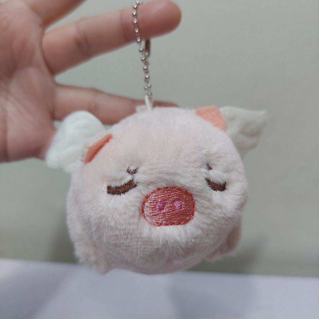 Angel Pig Plush Keychain Pull-String Moving Shaking Tail Bag Pendant Mini Stuffed Toy (Category: Plushies & Soft Toys) located in Pasig City. Submitted by muffinstoysshop (Listing ID 1469230297, Image 3). Description: Angel Pig Plush Keychain Pull-String Moving Shaking Tail Bag Pendant Mini Stuffed Toy - Size : 3.5- INCH / 9 cm - Quantity: 1 pc - Good as new - Cleaned & Sanitized - Good Condition - What you see is what you get! - Item ON HAND rea