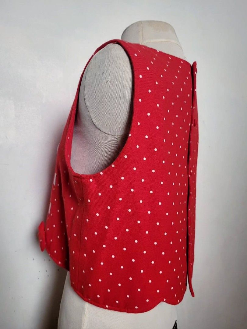 Cutest Retro Polka Top (Category: Blouses) located in Balanga. Submitted by marae_c (Listing ID 1469300213, Image 3). Description: Brand: Rich Girl In very good condition. Like new. No flaws. Very cute nito! Ganda ❤️ semi cropped with cute bow and scalloped edges. Button back closure. Perfect to paear over a dress or even sa pants/skirts. Very classic lang ang vibes. S-M frames best for Med.