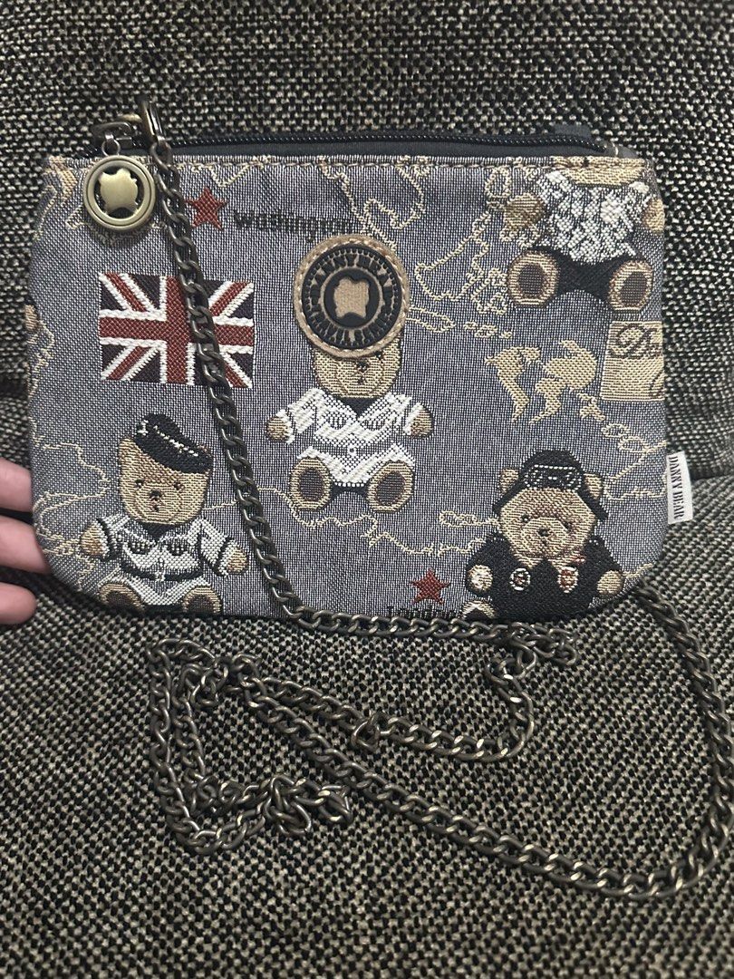 Danny Bear Tapestry Crossbody Bag with Chain Strap (Category: Cross-body Bags) located in Manila. Submitted by shayne2 (Listing ID 1469247287, Image 2). Description: Can fit iphone promax. Preloved good condition - Brand: Danny Bear - Design: Woven tapestry with cute teddy bears, Union Jack flags, and map graphics - Closure: Top zip closure - Strap: Metal chain strap - Interior: Brown fabric lining - Style: Fun vintage aesthetic, great for casual