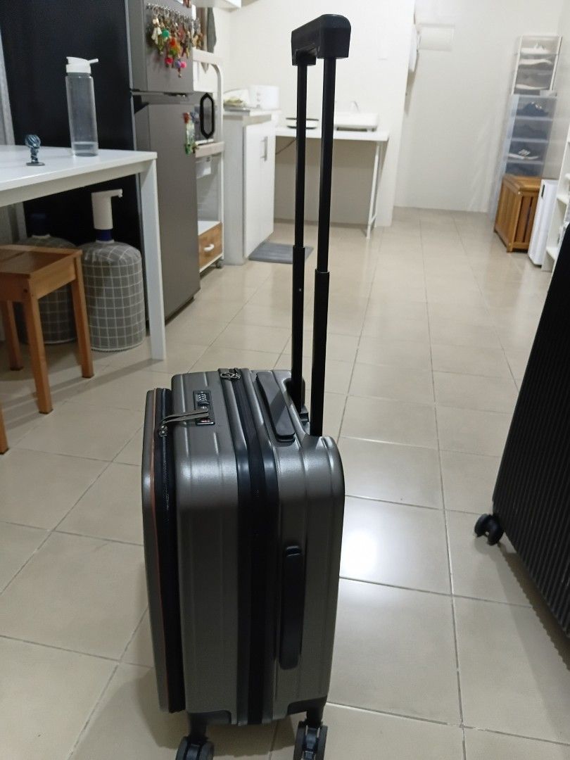 Dark Grey Hard Case Luggage with Built-In Cup Holder (Category: Luggage) located in Makati City. Submitted by mkdmaniego (Listing ID 1469241306, Image 3). Description: - Color: Dark Grey - Material: Durable hard-shell - Convenience: Built-in retractable cup holder on top - Mobility: Smooth-rolling dual spinner wheels in all directions - Security: Built-in side combination lock - Handle: Multi-stage locking telescopic handle plus top and side grab