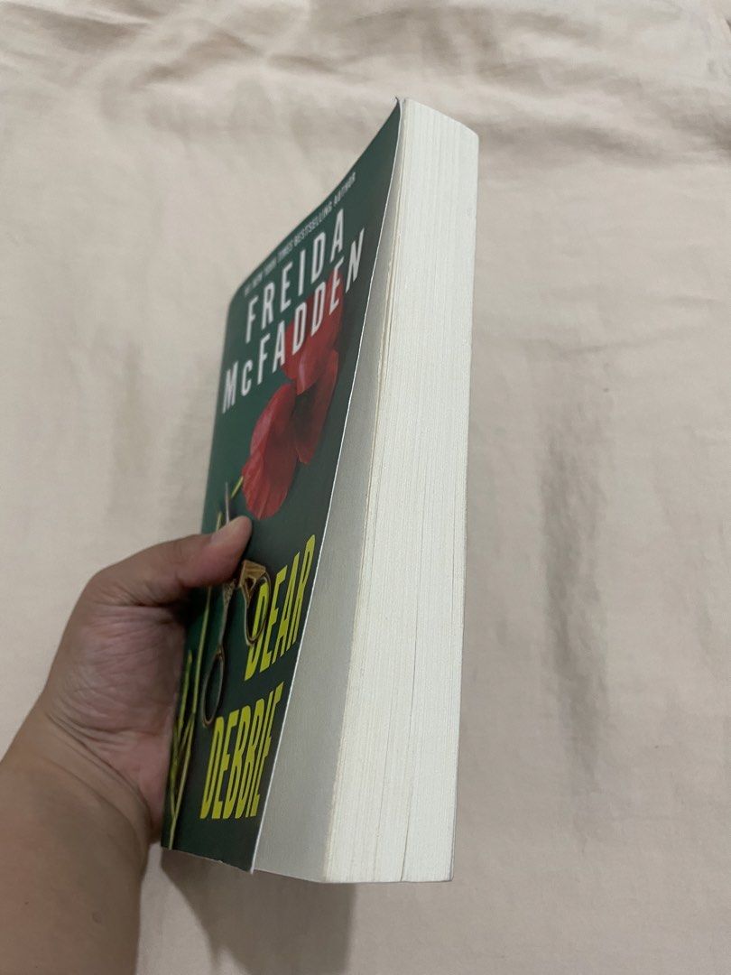 Dear Debbie by Freida McFadden Paperback (Category: Storybooks) located in Manila. Submitted by puredolphin_e419e1 (Listing ID 1469281274, Image 2). Description: - Author: Freida McFadden - Format: Paperback thriller novel - Condition: Like new, read once very carefully - Pages: Clean and white - Spine: No folds or creases - Storage: Kept on a bookshelf away from direct sunlight.