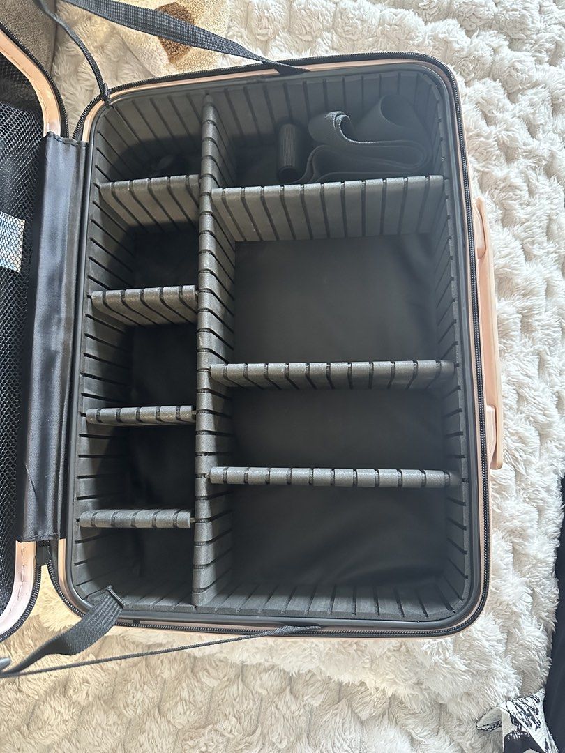 Defective Zipper Hard Shell Makeup Luggage Style (Category: Storage Boxes & Baskets) located in Taguig. Submitted by kathleen.tan (Listing ID 1469205743, Image 3). Description: One of the zippers is broken. The other one is working well but it might break also next time so selling this super low. Use it only at home, I dont trust the remaining zipper for any type of travel. Baka mahulog pa lahat ng makeup niyo. Can use it as your makeup organizer