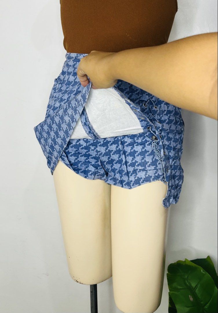 Denim Skort | S 26-27 (Category: Skirts) located in Manila. Submitted by bengirlclothing (Listing ID 1469308726, Image 3). Description: - Size: 26-27 inches - Length: 14 inches - Fit & Comfort: High-waisted style with built-in shorts underneath - Details: Decorative side lacing with grommets and front slit.