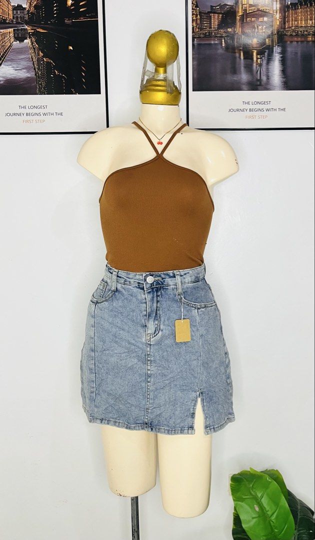 Denim Skort | S 27-29 (Category: Skirts) located in Manila. Submitted by bengirlclothing (Listing ID 1469301661, Image 2). Description: - Style: High waist light wash denim skort with built-in shorts for worry-free wear - Design: Chic front slit on the left, button closure, and functional belt loops - Pockets: Classic front pocket details - Fit/Size: Fits 27" to 29" waist - Length: Approximately 15 inches.