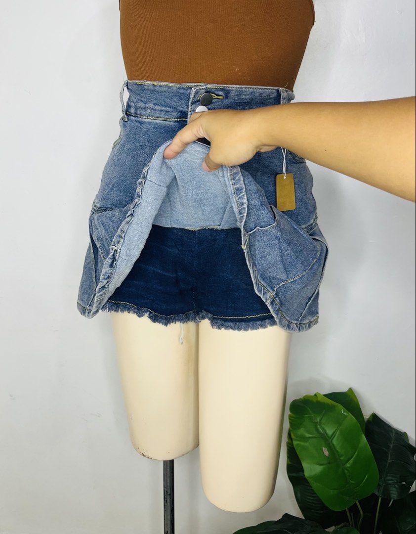 Denim Skort | S 32-35 (Category: Skirts) located in Manila. Submitted by bengirlclothing (Listing ID 1469308335, Image 3). Description: - Brand new with tag attached - Style: Denim skirt shorts (pleated front design) - Color: Classic blue - Fit: High-waisted with double button closure - Comfort: Built-in shorts underneath with raw hem detail - Measurements: Waist 32-35 inches, Length 15 inches - Item Code: G-23.