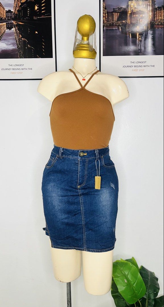 Denim Skort | Size 28-29 (Category: Skirts) located in Manila. Submitted by bengirlclothing (Listing ID 1469306997, Image 2). Description: - Size: Waist 28-29 inches - Length: 17 inches -Design: Dark blue high-waisted denim skirt with contrast yellow stitching and front pockets - Feature: Built-in black shorts underneath for extra coverage and comfort - Closure: Front button and zipper .
