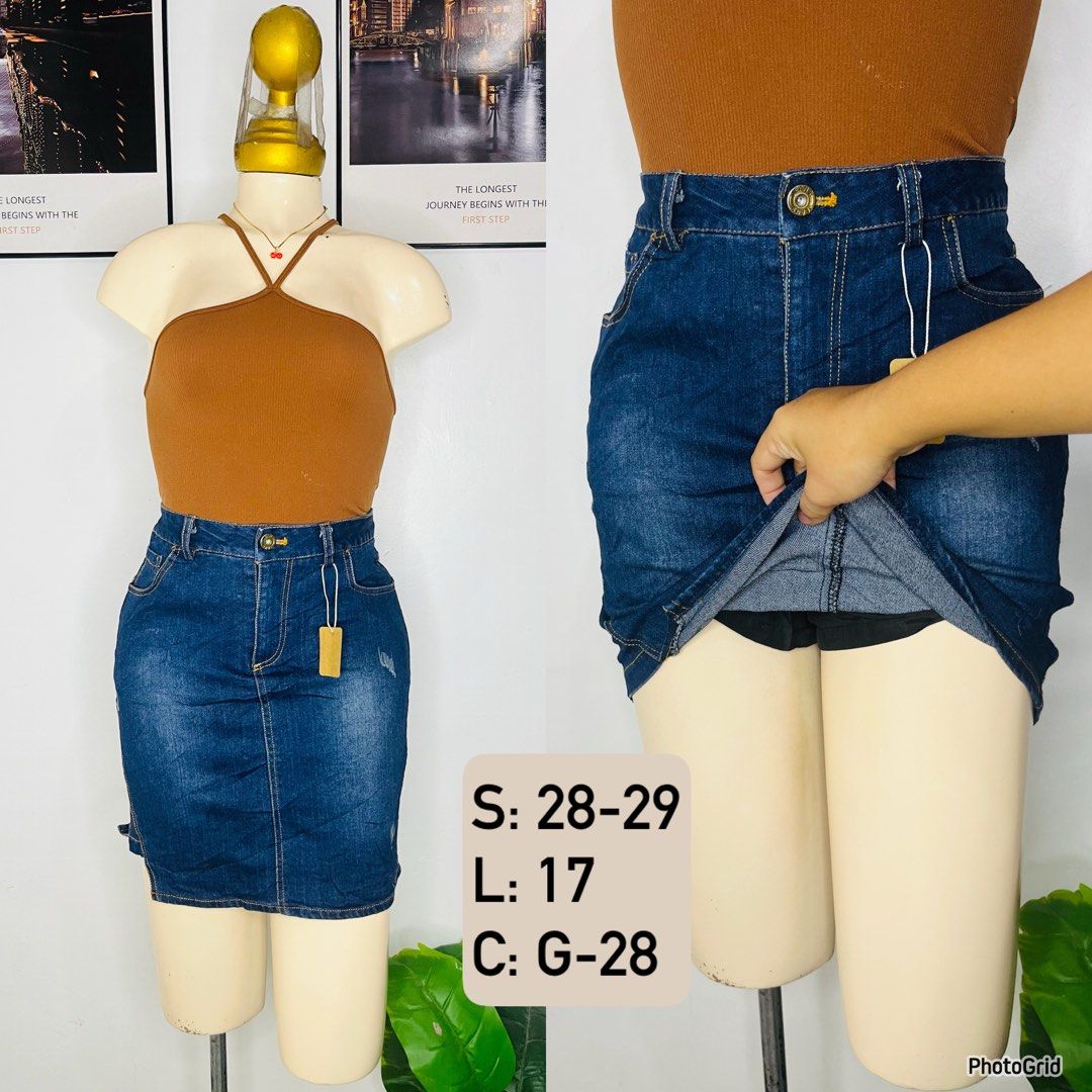 Denim Skort | Size 28-29 (Category: Skirts) located in Manila. Submitted by bengirlclothing (Listing ID 1469306997, Image 1). Description: - Size: Waist 28-29 inches - Length: 17 inches -Design: Dark blue high-waisted denim skirt with contrast yellow stitching and front pockets - Feature: Built-in black shorts underneath for extra coverage and comfort - Closure: Front button and zipper .