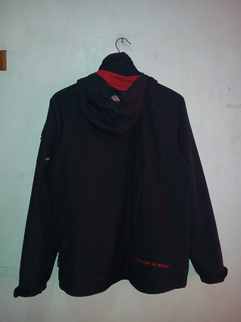 Dickies Black and Red Hooded Winter Jacket (Category: Coats, Jackets and Outerwear) located in Manila. Submitted by ninshok (Listing ID 1469163316, Image 3). Description: - Brand: Dickies - Color: Black with striking red inner lining and branding - Design: Mesh details, zip-up front with snap buttons, and adjustable hood drawstrings - Features: Practical outer pockets and comfortable ribbed cuffs - Fit: Regular fit, great for cold weather - Condi