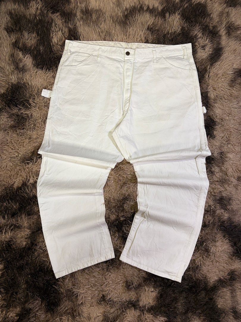 Dickies White Painter Pants Utility Workwear (Category: Jeans) located in Manila. Submitted by _valuevault777 (Listing ID 1469181016, Image 3). Description: - Brand/Model: Dickies White Painter Pants - Material: Heavy-duty cotton denim - Style: Classic utility with hammer loop, multiple tool pockets, and straight leg - Size: Length 41, Waist 42, Hem 10 inches - Condition: Good, solid construction with minor paint stains on the back pocket and leg