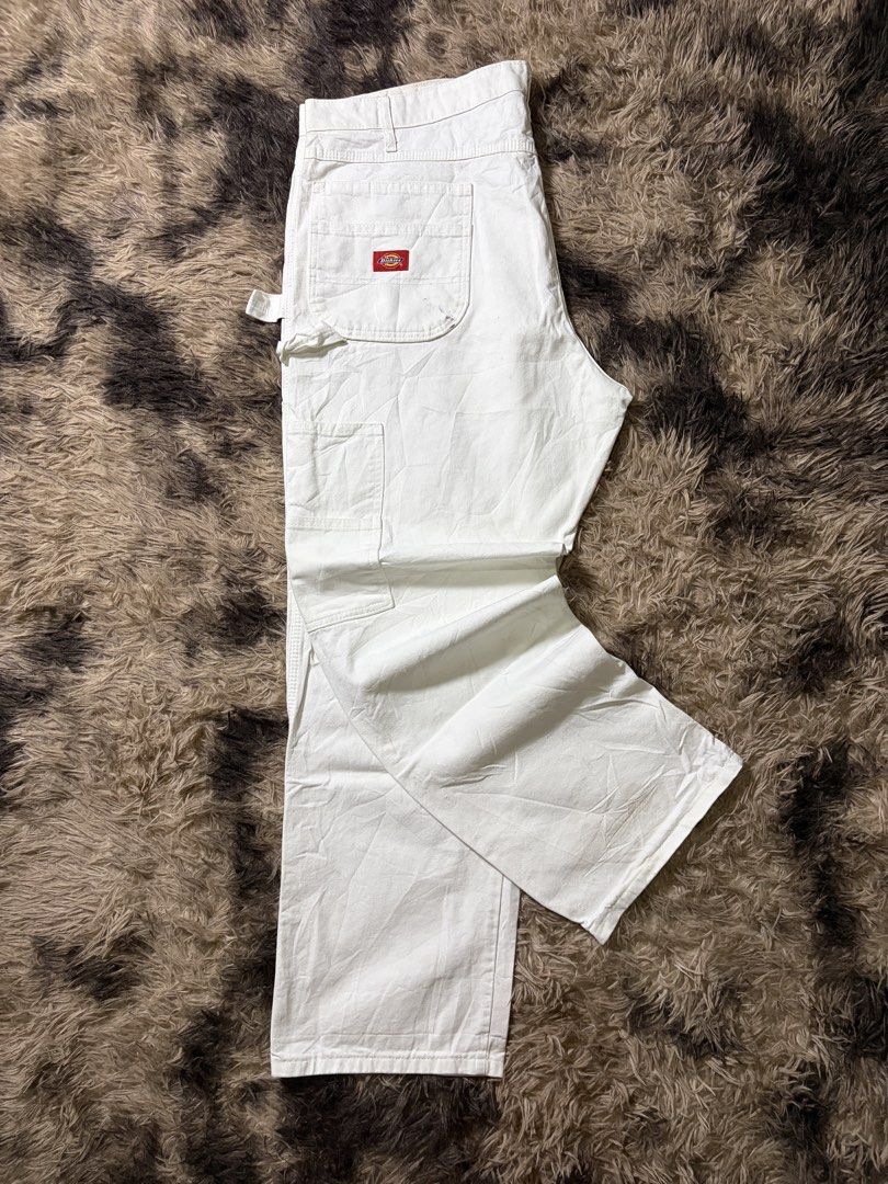 Dickies White Painter Pants Utility Workwear (Category: Jeans) located in Manila. Submitted by _valuevault777 (Listing ID 1469181016, Image 1). Description: - Brand/Model: Dickies White Painter Pants - Material: Heavy-duty cotton denim - Style: Classic utility with hammer loop, multiple tool pockets, and straight leg - Size: Length 41, Waist 42, Hem 10 inches - Condition: Good, solid construction with minor paint stains on the back pocket and leg