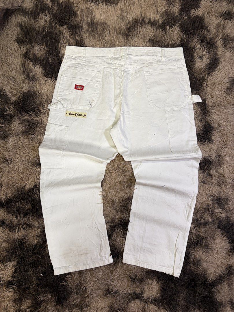 Dickies White Painter Pants Utility Workwear (Category: Jeans) located in Manila. Submitted by _valuevault777 (Listing ID 1469181016, Image 2). Description: - Brand/Model: Dickies White Painter Pants - Material: Heavy-duty cotton denim - Style: Classic utility with hammer loop, multiple tool pockets, and straight leg - Size: Length 41, Waist 42, Hem 10 inches - Condition: Good, solid construction with minor paint stains on the back pocket and leg