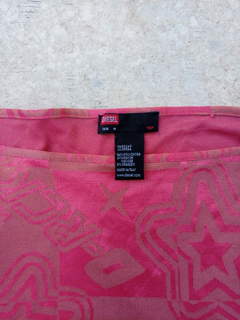 Diesel Pink Star Mesh Off Shoulder Top (Category: Sleeveless) located in Magallanes. Submitted by thrift.culture2026 (Listing ID 1469178340, Image 2). Description: Good condition issues scratch 9/10 color rate L 21 W 16 NOTE: Hindi Yan issues nasa first pic tubig lang yan.