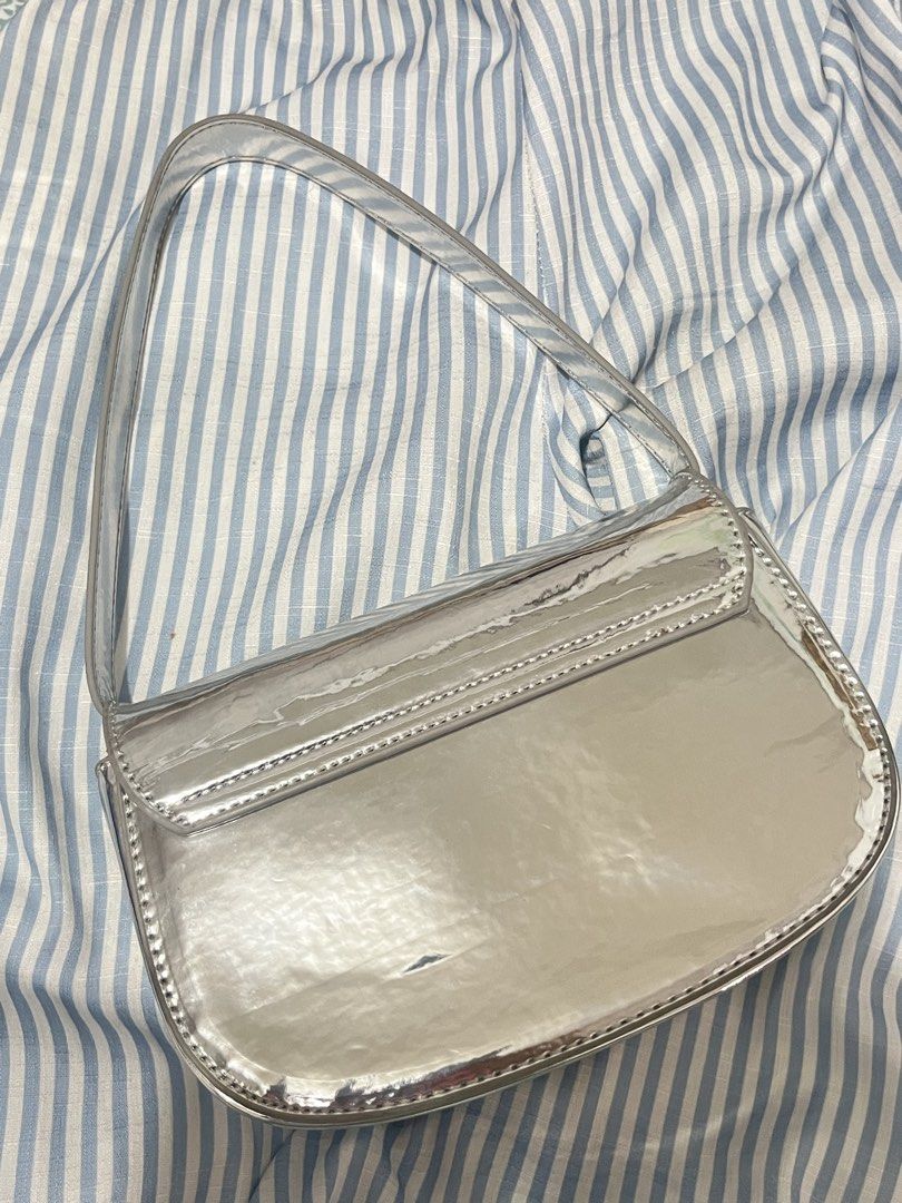 Diesel Silver Metallic Shoulder Bag (Category: Shoulder Bags) located in Rizal. Submitted by cwassnut (Listing ID 1469164428, Image 2). Description: Diesel Silver Bag - long strap included - dm for more pics and infos - mop: bdo online transfer - rfs: decluttering.