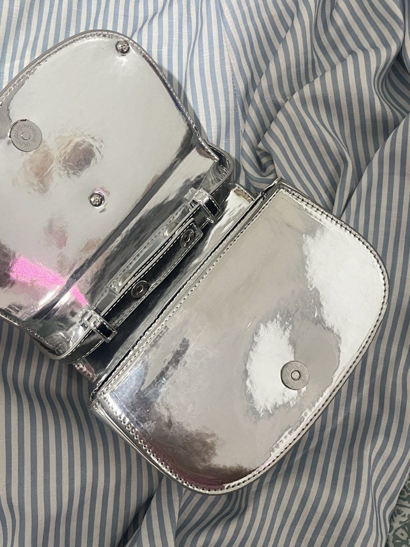 Diesel Silver Metallic Shoulder Bag (Category: Shoulder Bags) located in Rizal. Submitted by cwassnut (Listing ID 1469164428, Image 3). Description: Diesel Silver Bag - long strap included - dm for more pics and infos - mop: bdo online transfer - rfs: decluttering.