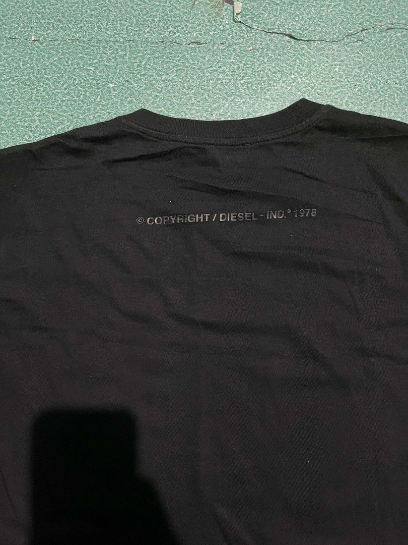Diesel T-shirt (Category: Tshirts & Polo Shirts ) located in Makati City. Submitted by its_tim (Listing ID 1469318732, Image 3). Description: Width-21.5 Length-29 size medium on tag but fit to large Issue:See the last picture.