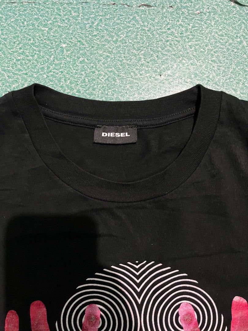 Diesel T-shirt (Category: Tshirts & Polo Shirts ) located in Makati City. Submitted by its_tim (Listing ID 1469318732, Image 1). Description: Width-21.5 Length-29 size medium on tag but fit to large Issue:See the last picture.