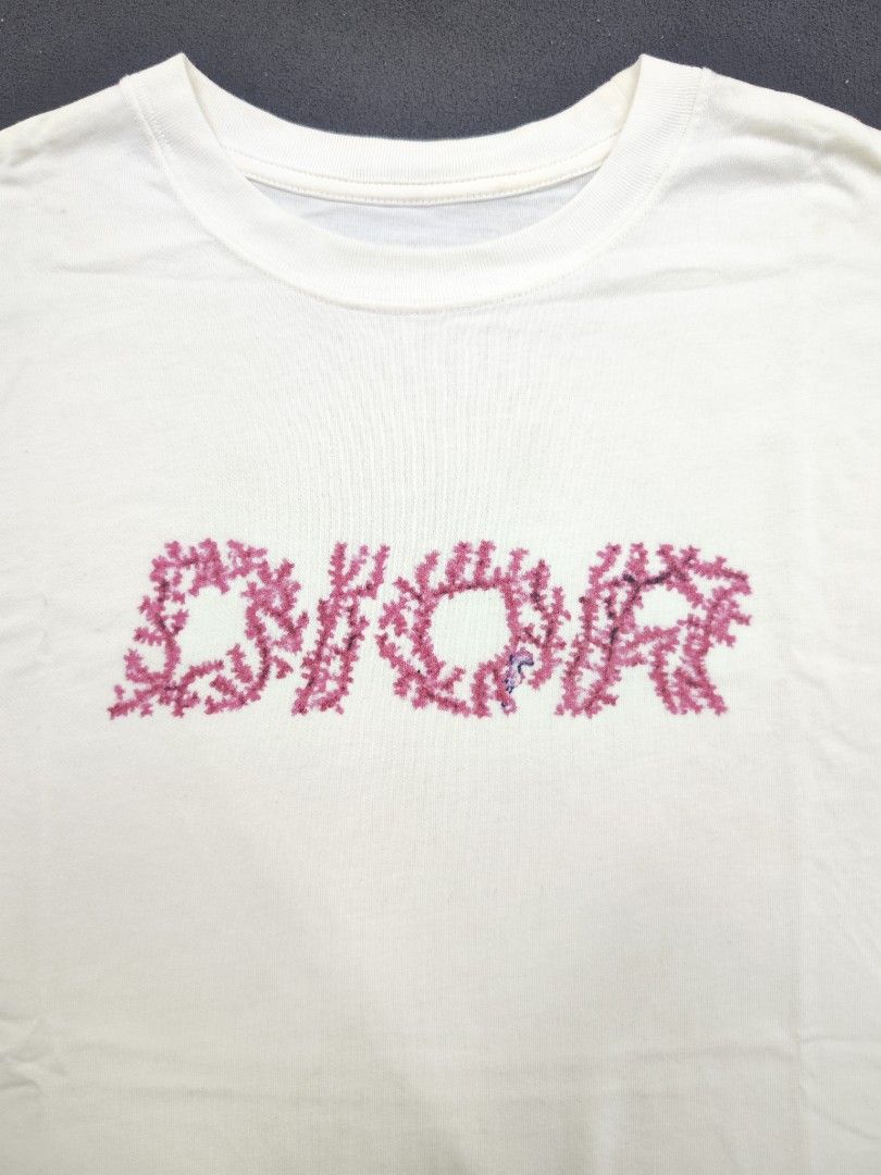 Dior Italic Coral Tee (Category: Luxury Apparel) located in Bulacan. Submitted by emilj23 (Listing ID 1469197166, Image 2). Description: Dior Italic Coral Tee Size S on tag L 27 W 20 Condition 9/10 Color rate 9/10 Issue Minimal Stains Need Wash,Cut Neck Tag.