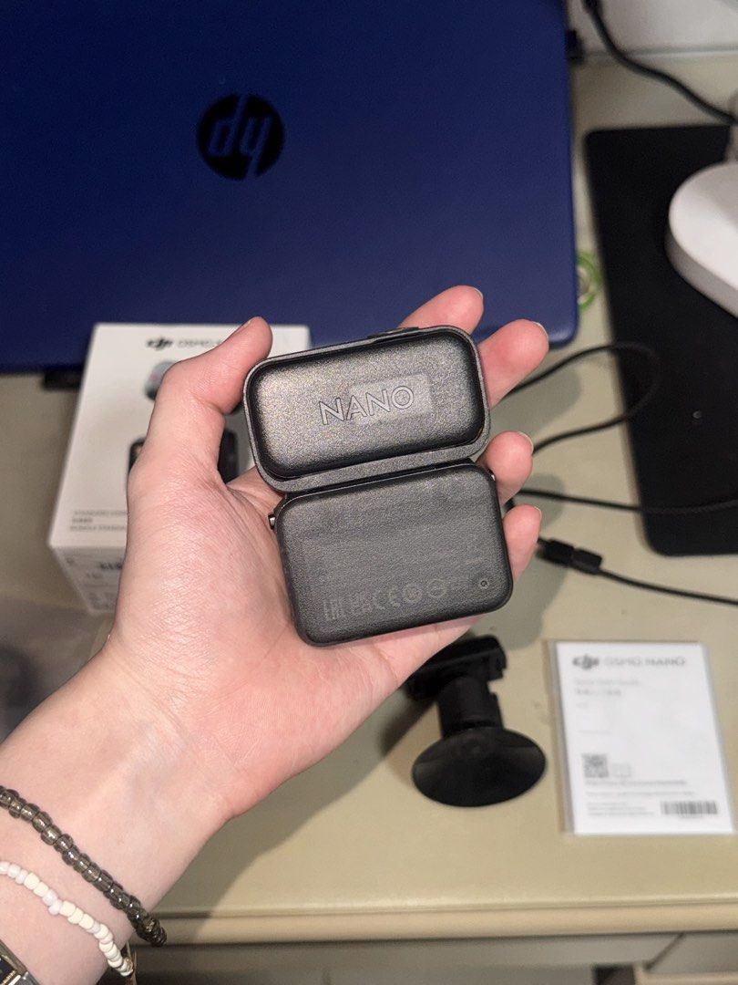 DJI Osmo Nano Standard Combo 128GB Action Camera (Category: Video Cameras) located in Manila. Submitted by kchloelim (Listing ID 1469358306, Image 2). Description: - Item: DJI Osmo Nano Standard Combo Set - Storage: 128GB capacity included - Condition: Fully functional, perfect for vlogging and outdoor recording - Inclusions: Camera unit with touchscreen, protective case, magnetic lanyard necklace, suction cup mount, clip mount, and charging cabl