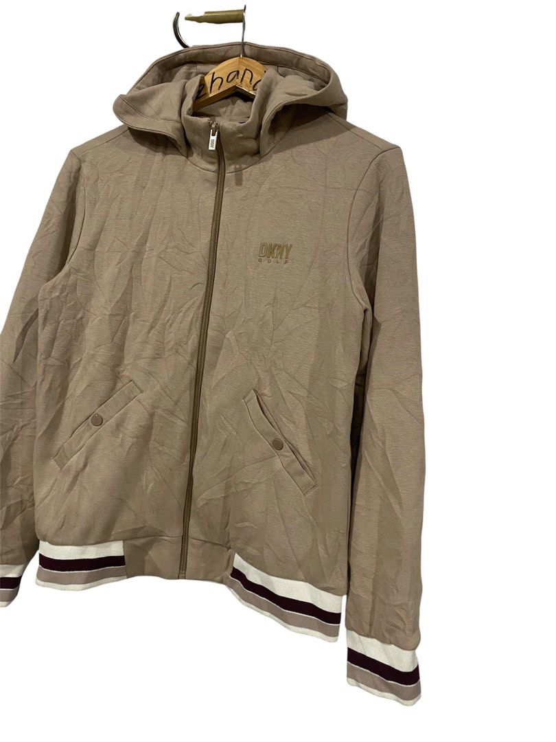 DKNY bomber Jacket with hood (Category: Coats, Jackets and Outerwear) located in Digos. Submitted by zhanderapp47607 (Listing ID 1469245374, Image 3). Description: DKNY bomber Jacket with hood Size medium tag Dimension 20x25 Excellent condition Colorate 9.8/10 No iisue .