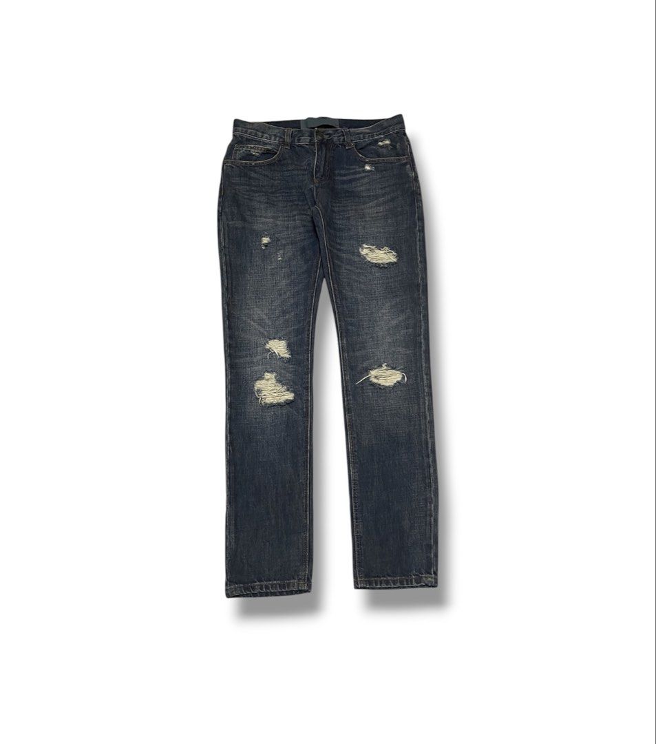 Dolce & Gabbana Ripped Denim Jeans (Category: Luxury Apparel) located in Bulacan. Submitted by sanjisthrift (Listing ID 1469179764, Image 1). Description: Width 33 Length 43 Opening 6.5 Very Good Condition 9/10 Minor stain.