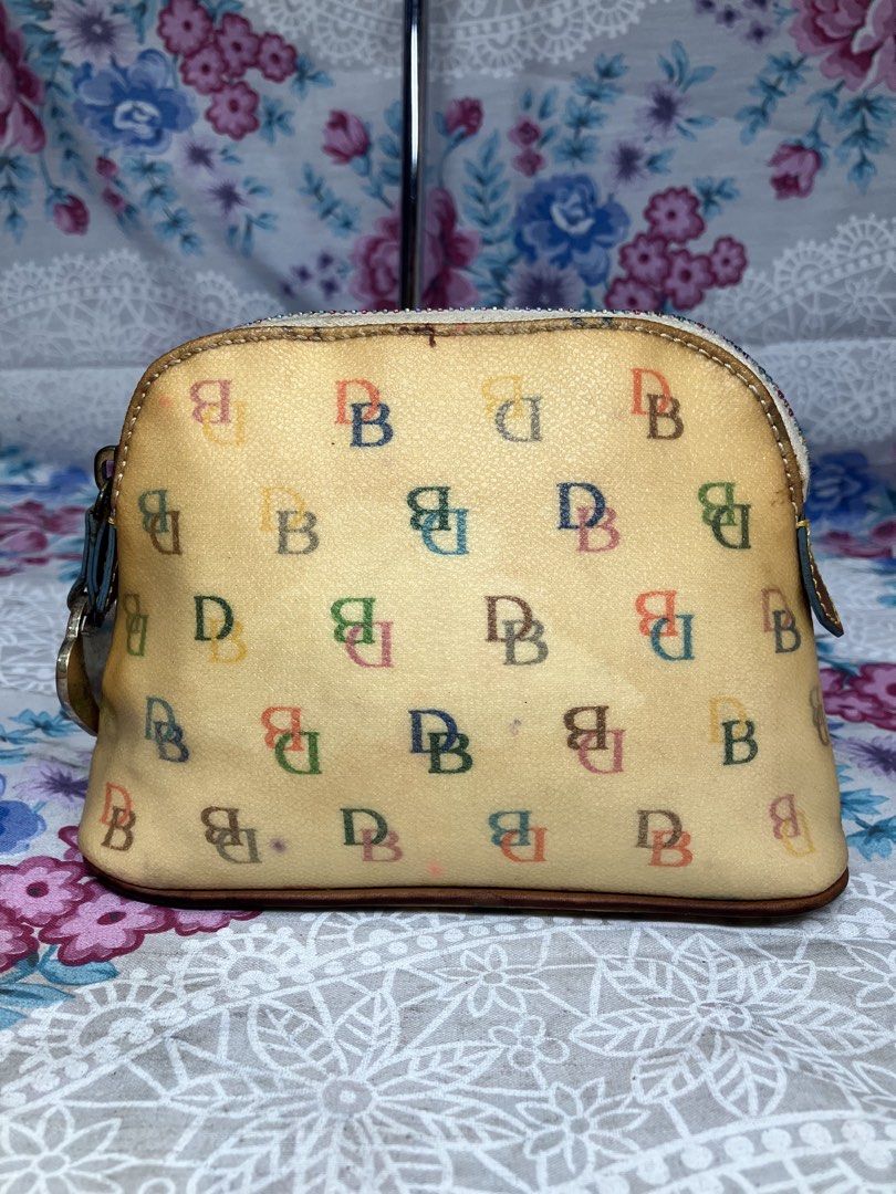 DOONEY & BOURKE RAINBOW MONOGRAM DOOMED COSTEMIC POUCH (Category: Purses & Pouches) located in General Mariano Alvarez. Submitted by adonid (Listing ID 1469179309, Image 2). Description: DOONEY & BOURKE RAINBOW MONOGRAM DOOMED COSTEMIC POUCH GOOD CONDITION NORMAL SIGN OF USAGE ONLY.